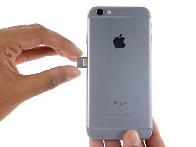 SIM tray being removed from iPhone 6