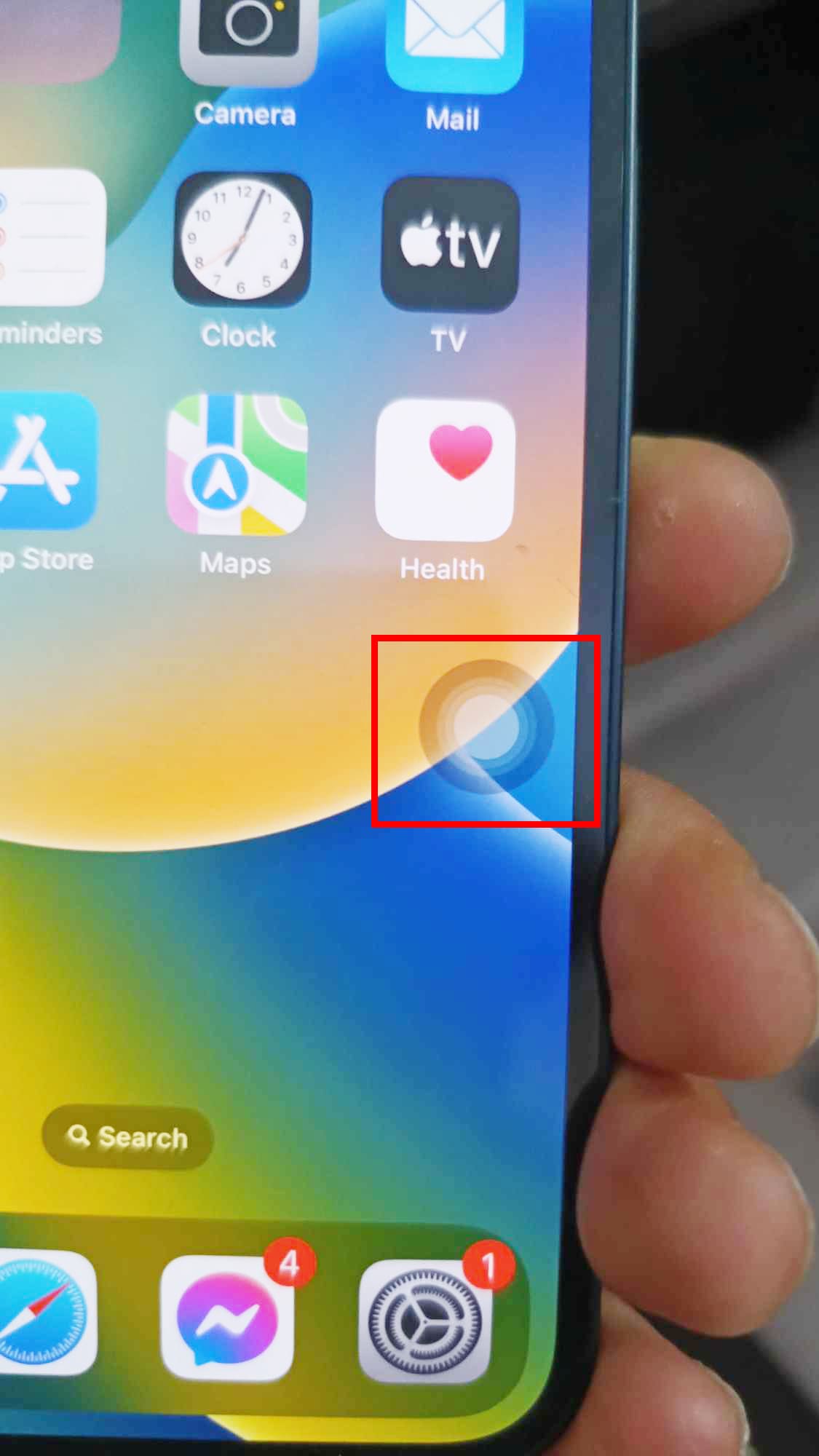The AssistiveTouch button on iPhone