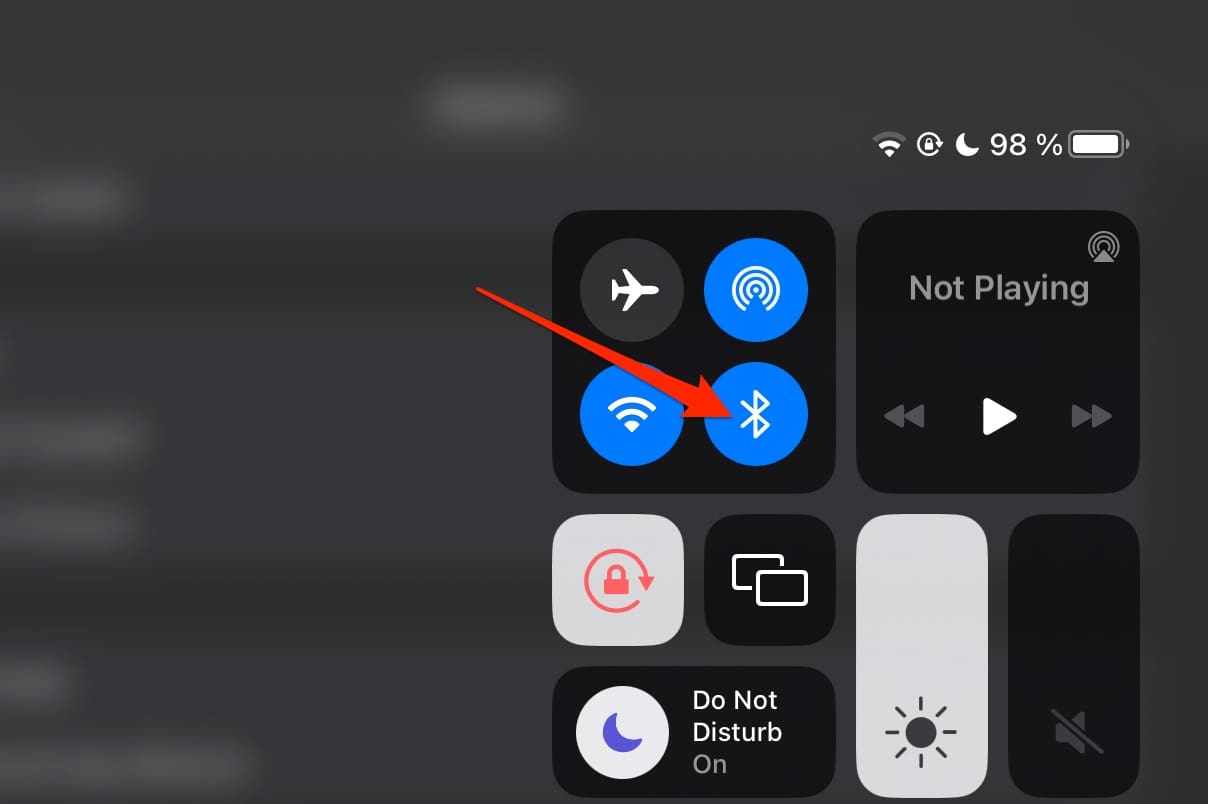 Turn off Bluetooth on your iPad by opening the Control Center and selecting that particular icon