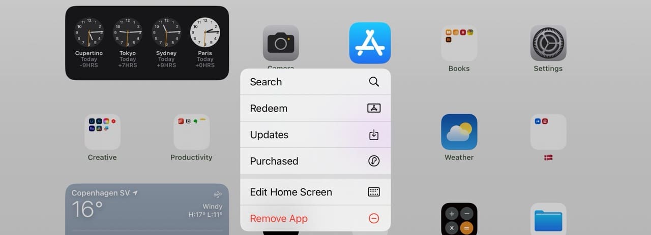 Select the Purchased Tab in the App Store