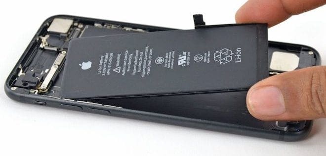 Internals of an iPhone, clearly showing the lithium-ion battery inside