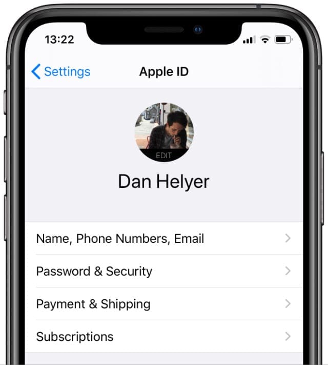 Apple ID settings on iPhone showing Payment & Shipping option