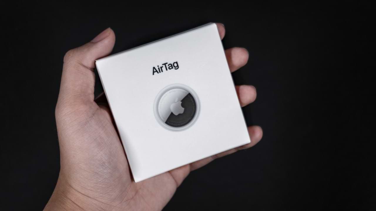 AirTags Box in Someone's Hand