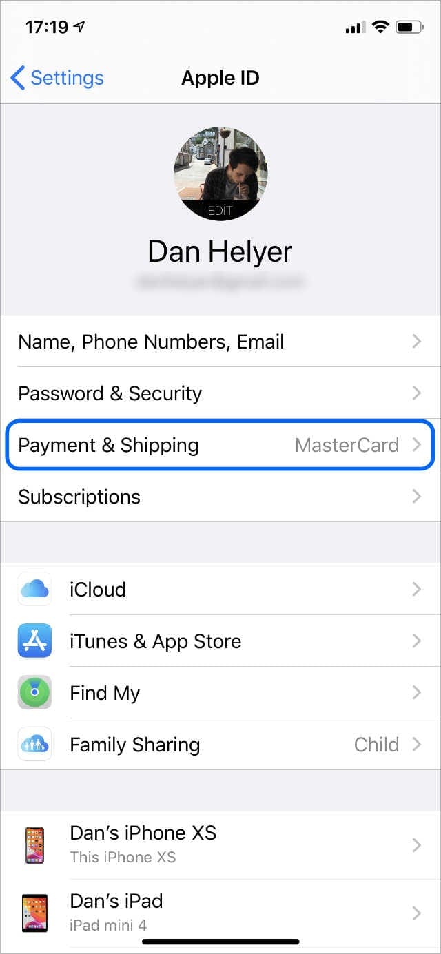 Apple ID information page on iPhone with Payment & Shipping higlighted