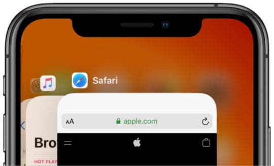 iPhone app switcher view with Safari app to close