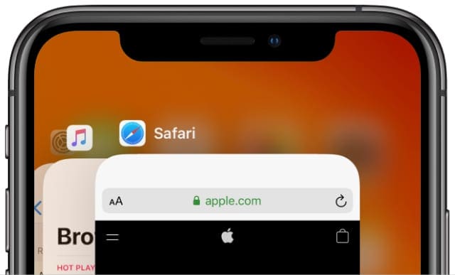 iPhone app switcher view with Safari app to close