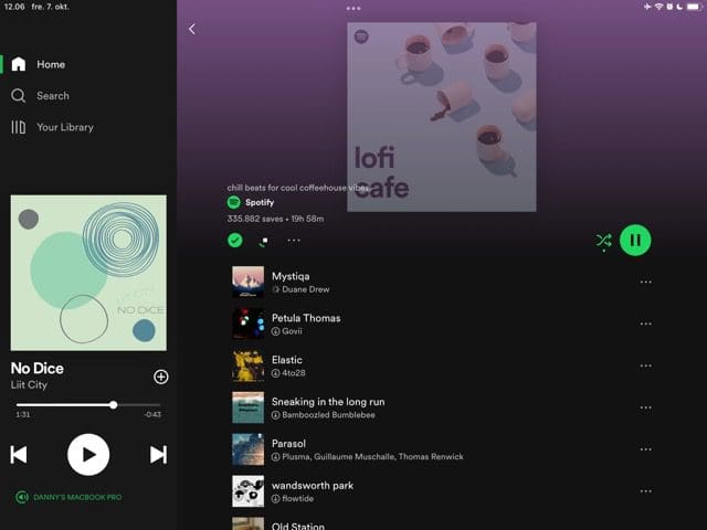 Screenshot showing a playlist downloading on Spotify for iPad