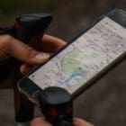 Photo of a person using a map on iphone